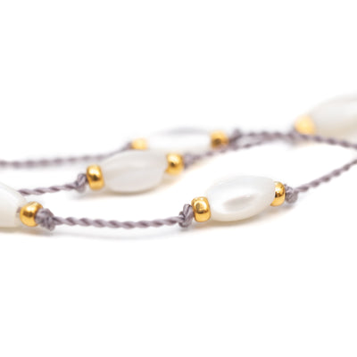 Our stretch Halo Mother of Pearl anklet is fun, durable and a Bronwen Jewelry favorite. Jewelry for an active lifestyle.