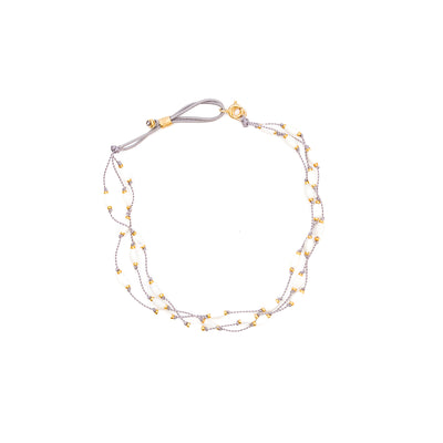 Our stretch Halo Mother of Pearl anklet is fun, durable and a Bronwen Jewelry favorite. Jewelry for an active lifestyle.