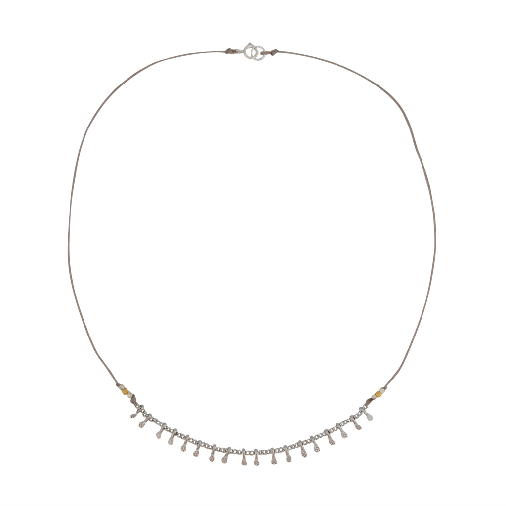 Our Dew Drop necklace is water worthy and durable, in silver or gold, a Bronwen Jewelry favorite for your active lifestyle