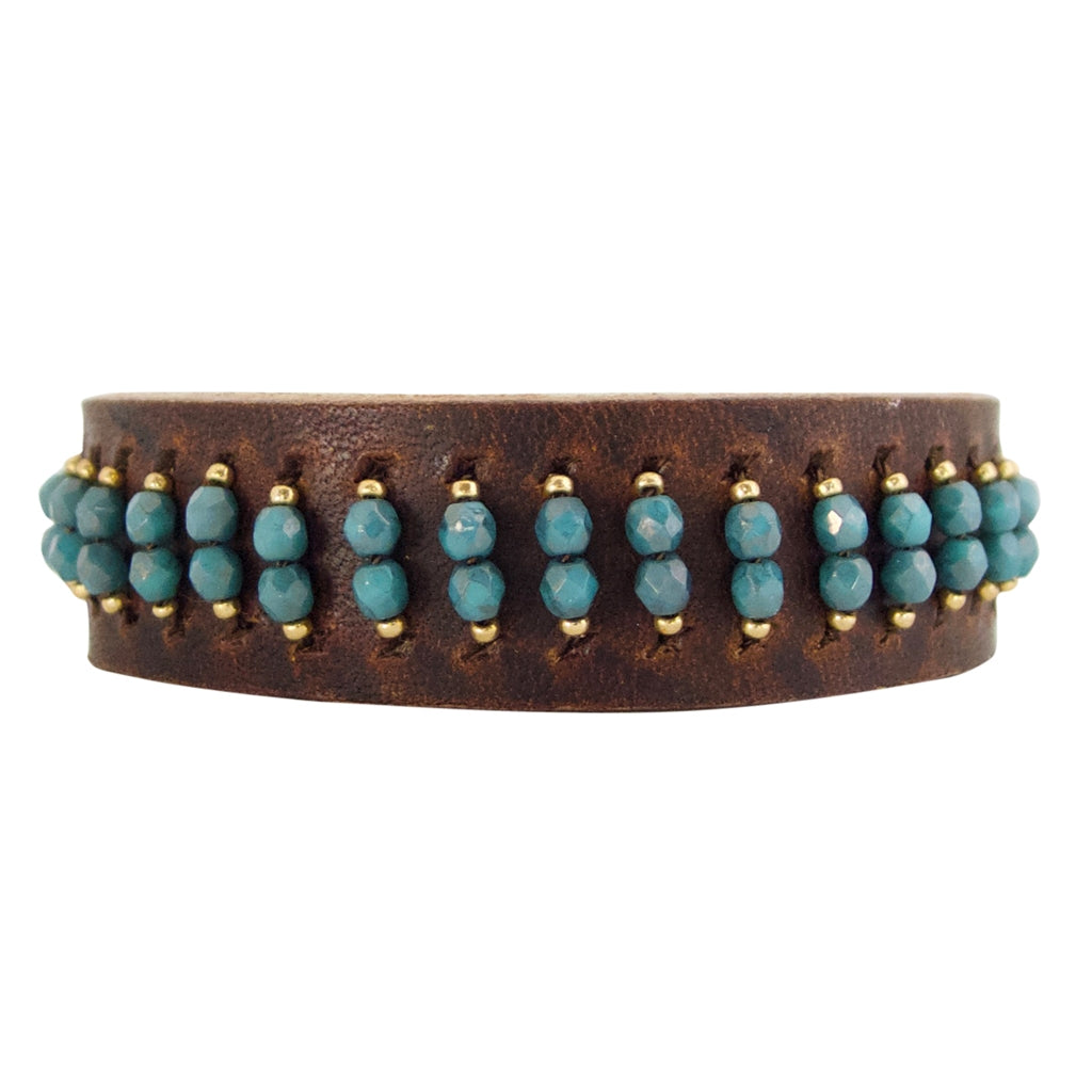 Our Leather Cuff bracelets with Czech glass beads are edgy and elegant. A Bronwen Jewelry must have.